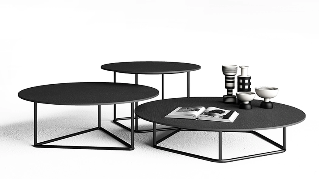Tavolini con top in cemento antracite Circus di Minotti Italia
