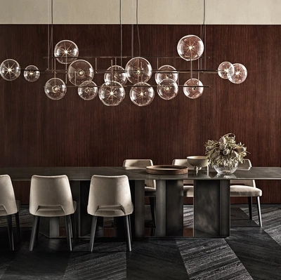 Lampada a sospensione Bolle Orizzontale in cristallo trasparente soffiato con parti metalliche in ottone brunito a mano di Gallotti&Radice