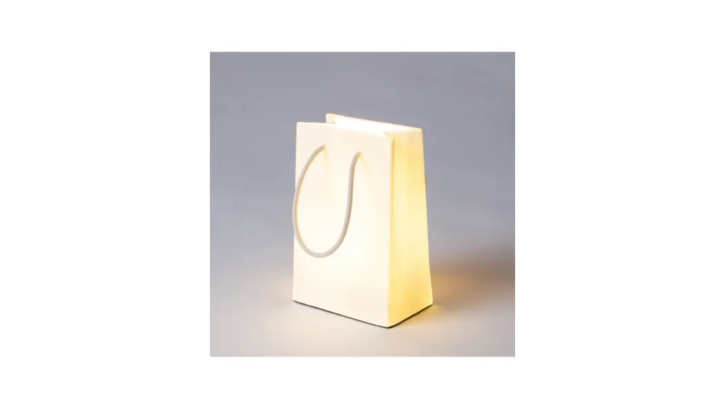 Lampada in resina a led dimmerabile a forma di sacchetto Daily Glow Shopper di Seletti