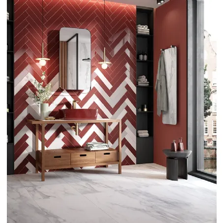 Piastrelle in ceramica rettangolari posate a spina di pesce Fattamano Maroon di Terratinta