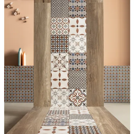 Piastrelle in gres porcellanato smaltato in 8 diverse opzioni decorative, accomunate dal colore rosso Romanza di Terratinta