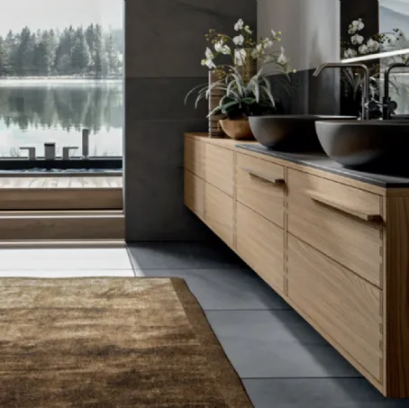 Mobile da Bagno sospeso in Castagno tinto Naturale con top in laminam Calce Nera Ade 001 di Edoné