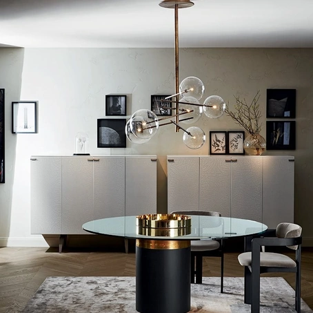 Tavolo rotondo in cristallo con base in legno Haumea-T di Gallotti&Radice