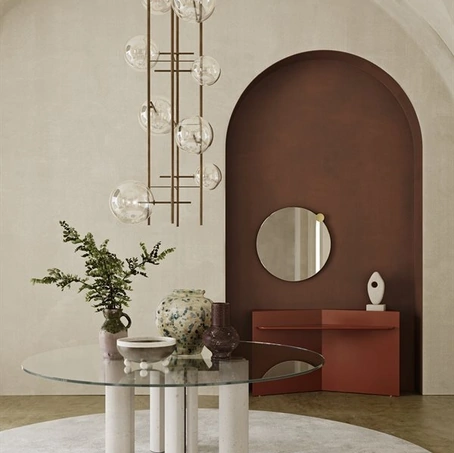 Tavolo rotondo Simpòdio con piano in cristallo e basi in cemento alleggerito color avorio di Gallotti&Radice